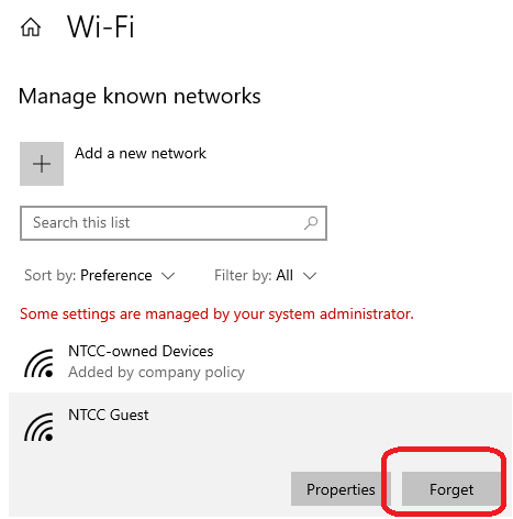 Screenshot of manage known networks page in settings app, indicating where the "forget" button is located