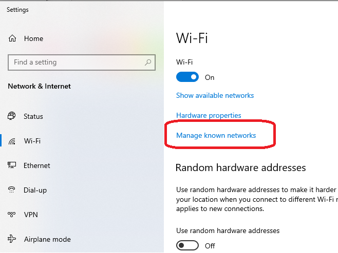 Screenshot of Windows 10 wifi settings page, indicating the location of "manage known networks" button